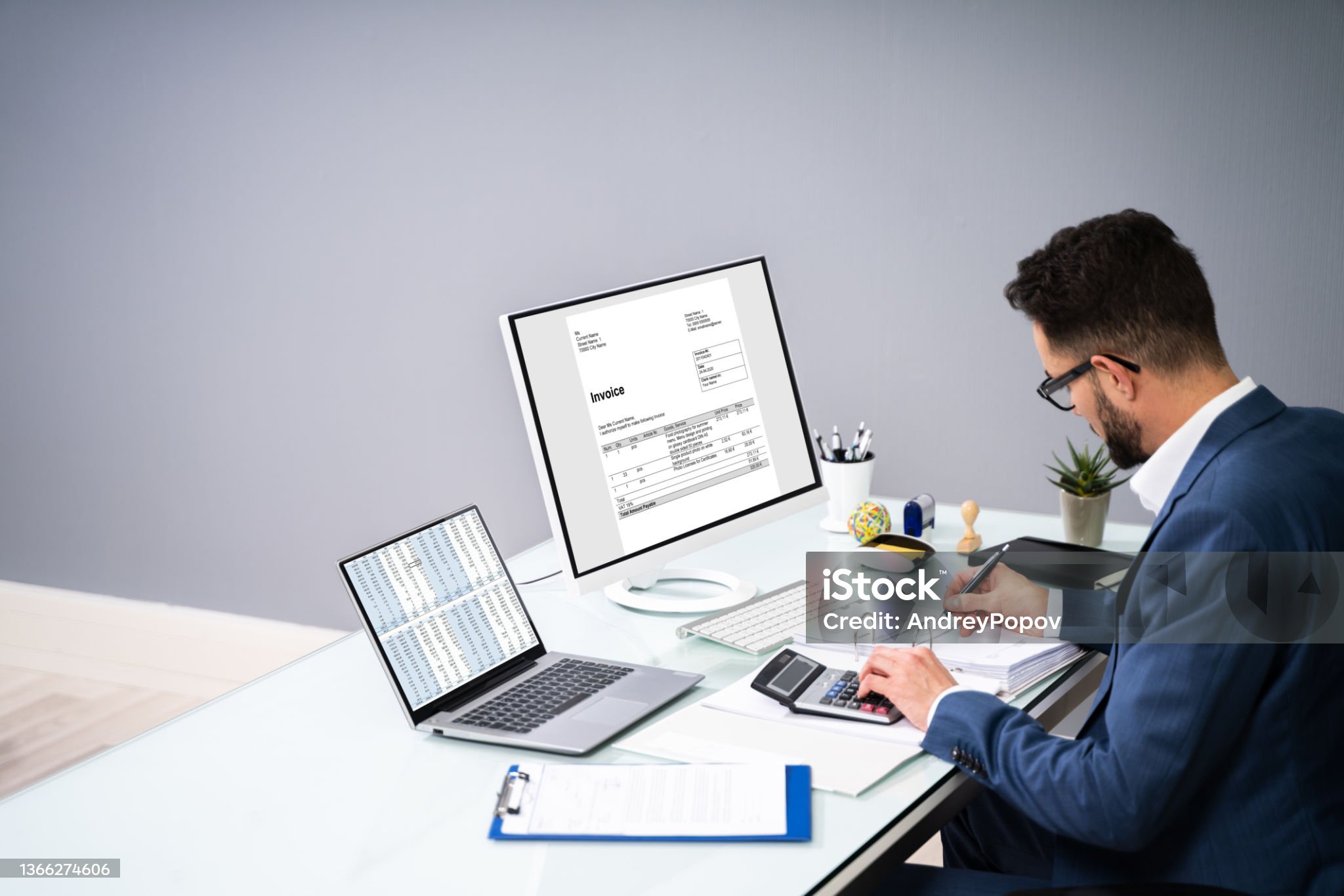 Business Invoice Tax Management. Accountant Using Monitor